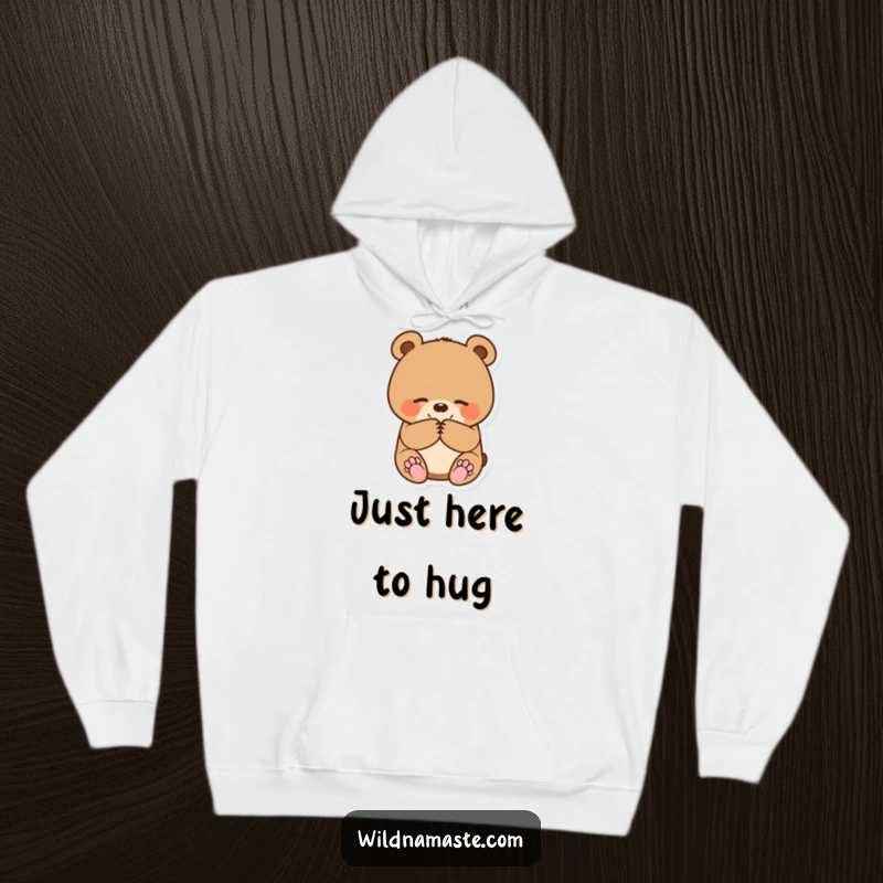 Funny hoodie adorned with a small, round bear cub bowing politely with paws together, offering cozy comfort.